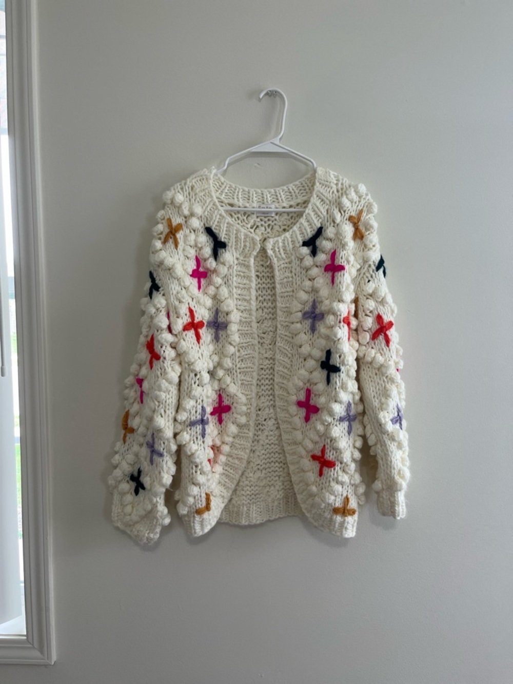 Fate Cream Hand-Knit Pom-Pom Cardigan with Multicolor Crosses